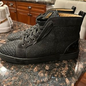 Black high top. Designer. Gently used.